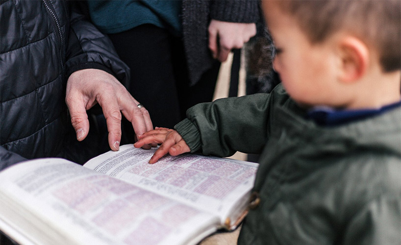 Kid-Reading-Bible-at-Church-Youth-Day